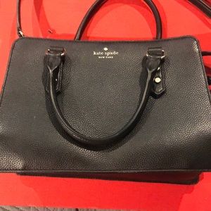Black Kate Spade purse.